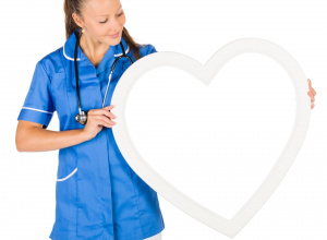 Pielęgniarka trzymająca symbol serca